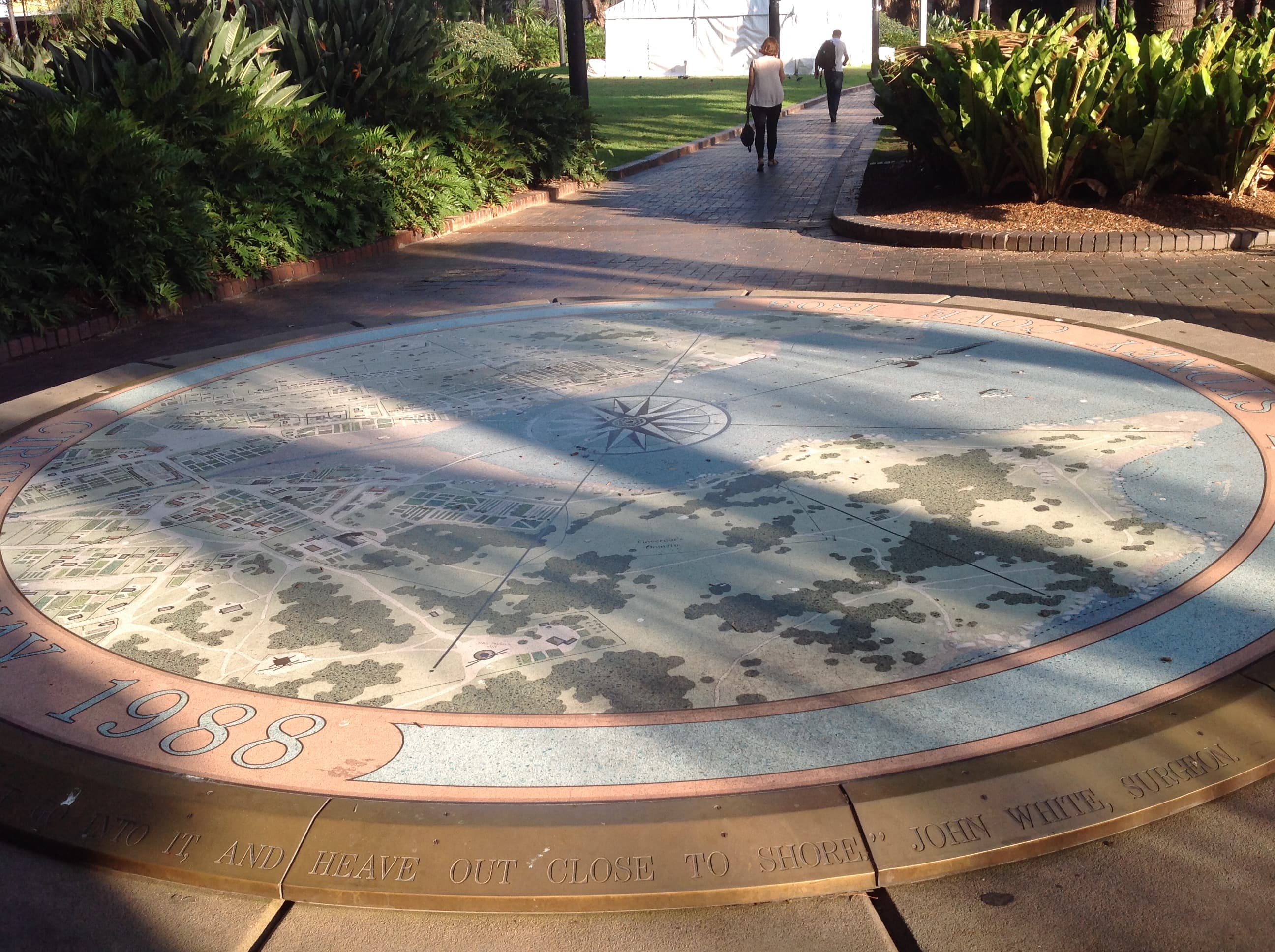 Sydney Cove 1808 terrazzo map before restoration, with a dull, faded surface and washed-out colours