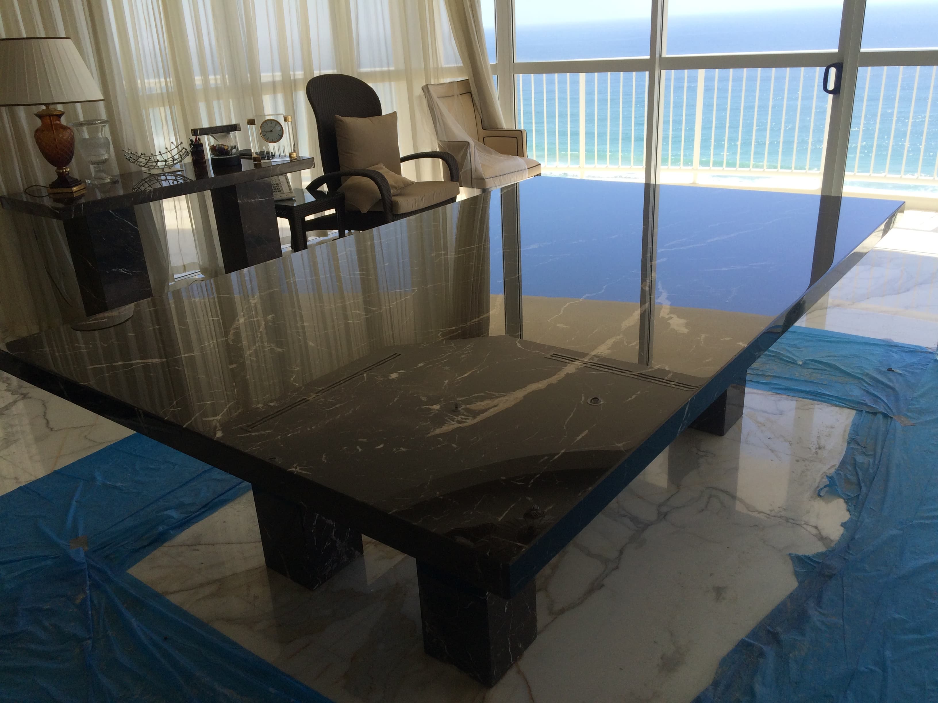 The same Nero Marquina table after grinding, polishing and sealing
