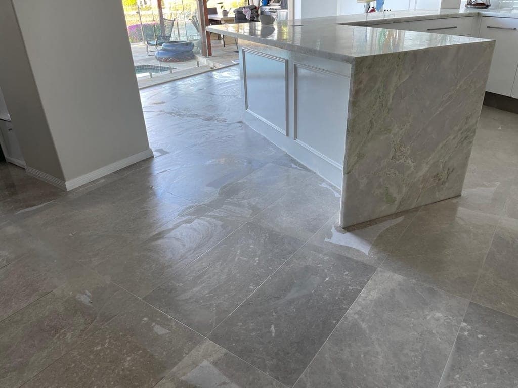Dining-area marble floor with all joints filled, ready for further grinding