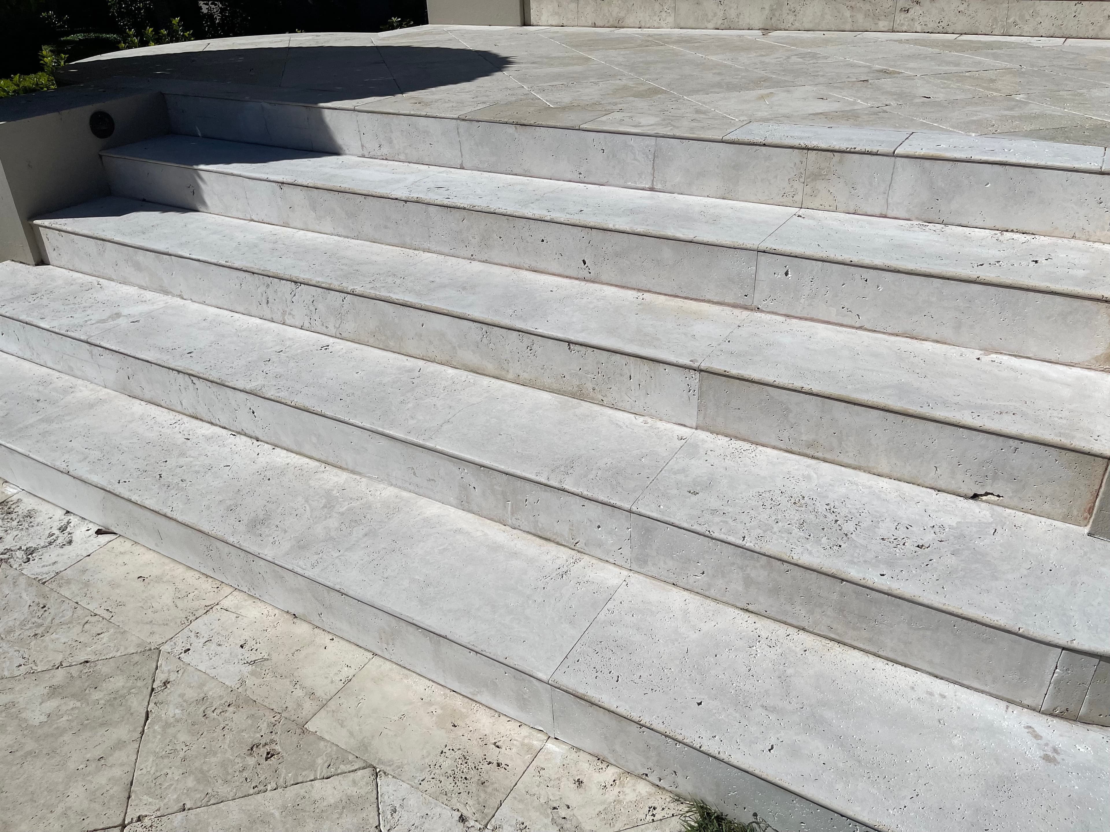 Restored natural travertine entrance stairs