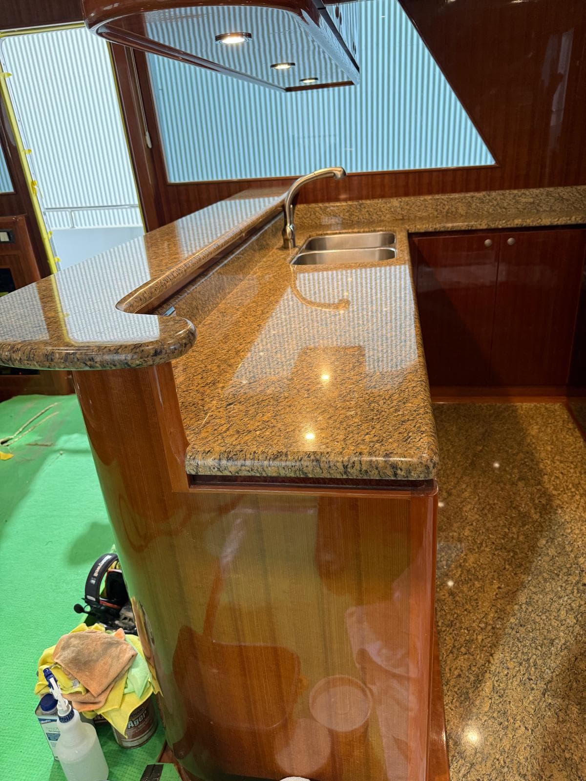 Granite benchtop being re-polished on site