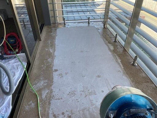 Limestone floor being ground back with a diamond machine